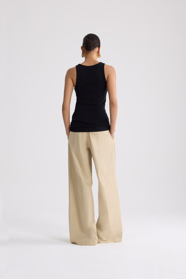 Patou - Organic cotton knot strap tank top - Black - Black knot strap tank top. Strap with knot. White embroidered Patou logo on the front.