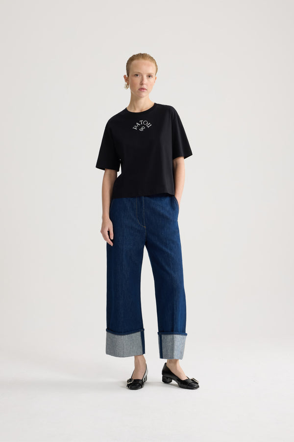 Patou - Polo-T-Shirt aus Bio-Baumwolle - Black - Schwarzes Polo-T-Shirt. Kurze Ärmel. Weiß gesticktes Patou-Logo auf der Vorderseite.