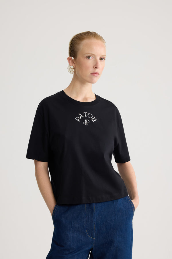 Patou - Polo-T-Shirt aus Bio-Baumwolle - Black - Schwarzes Polo-T-Shirt. Kurze Ärmel. Weiß gesticktes Patou-Logo auf der Vorderseite.