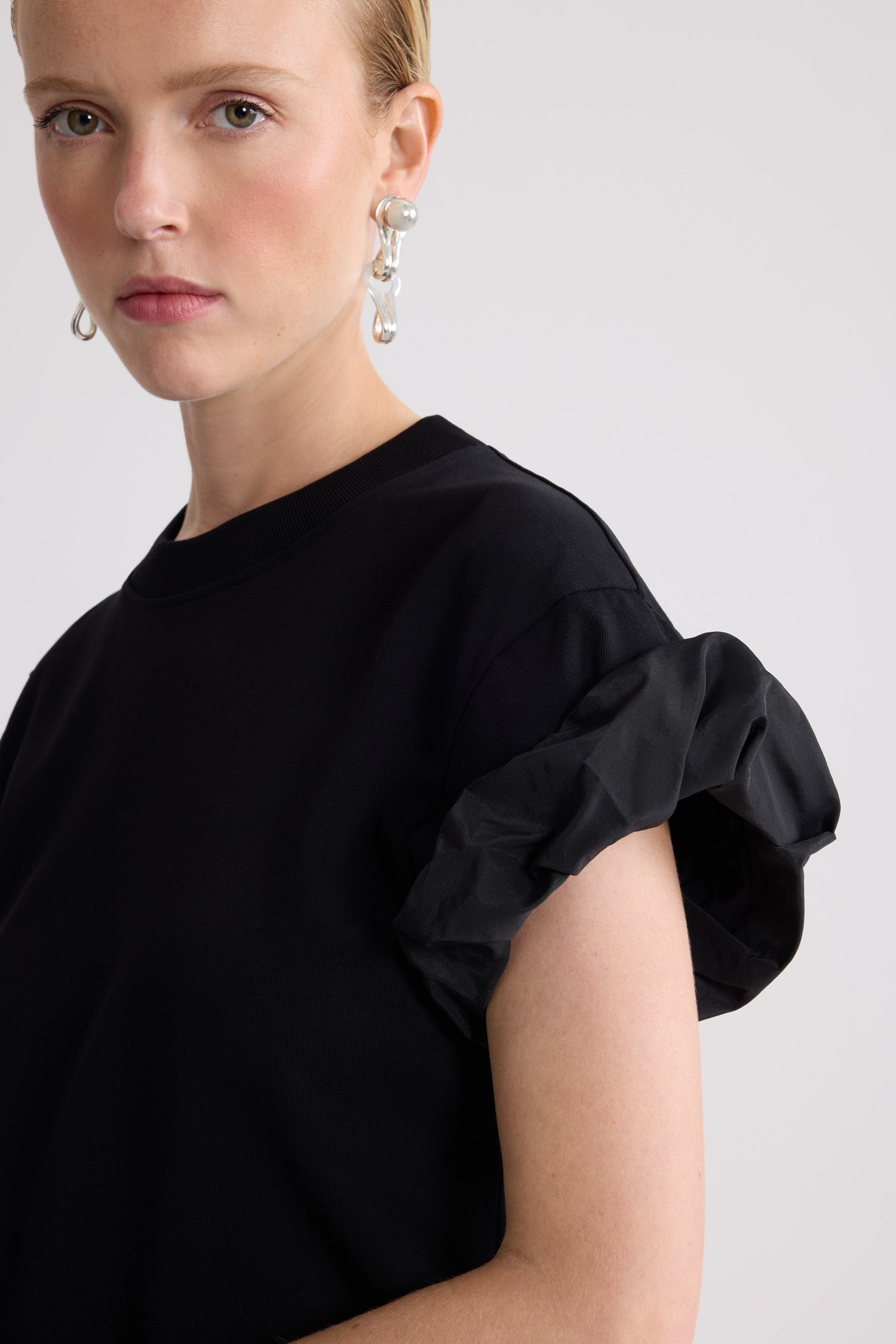 Patou - Organic cotton T-shirt with faille sleeve details - Black - Black organic cotton T-shirt with faille details on the sleeves. Tone-on-tone embroidered JP logo on the front.