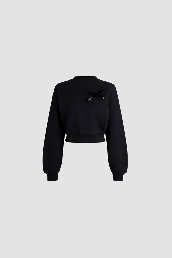 Patou - Cropped bow sweatshirt in organic cotton - Black - Black organic cotton sweatshirt. Round neckline. Bow detail with embroidered logo on the chest. Loose volume. Cropped fit. Ribbed hem and cuffs.