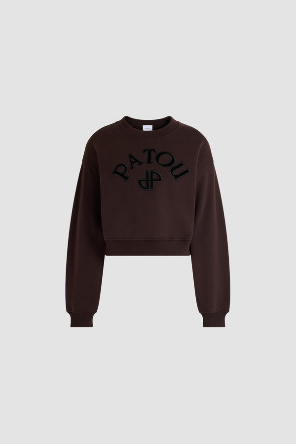 Patou - Sweatshirt aus Bio-Baumwolle - Winter Mocha - Braunes Sweatshirt aus Bio-Baumwolle. Runder Ausschnitt. Patou-Logo und kontrastierendes JP-Monogramm vorne. Rippbund an Saum und Ärmeln.