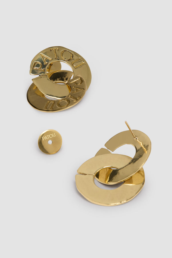 Patou - Boucles d&#39;oreilles pièce doubles en laiton doré - Gold - Boucles d&#39;oreilles en laiton doré. Inspiration pièces antiques. Texture martelée. Pièces entrelacées gravées Patou. Fermoir poussette.