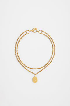 Bocca-Halskette mit Charm aus vergoldetem Messing