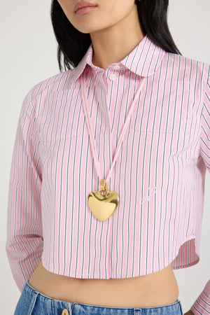 Collana con pendente cuore in ottone dorato e cotone