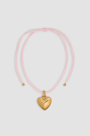 Collana con pendente cuore in ottone dorato e cotone