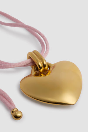 Collana con pendente cuore in ottone dorato e cotone