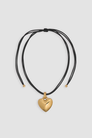 Collana con pendente cuore in ottone dorato e cotone