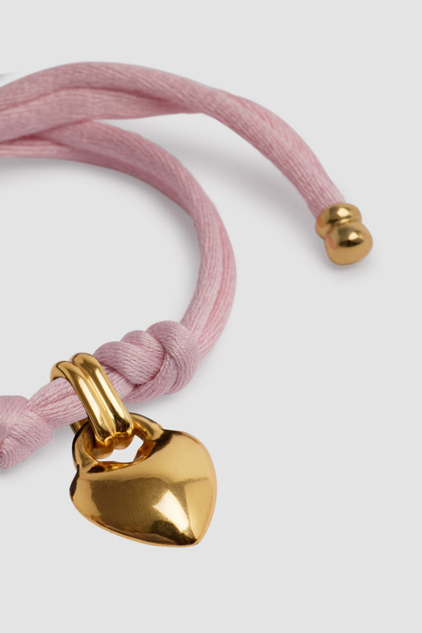 Patou - Bracciale con cuore in ottone dorato e cotone - Primrose Pink - Bracciale in ottone dorato e cotone rosa. Charm a cuore. Doppio spago con punte in ottone dorato.