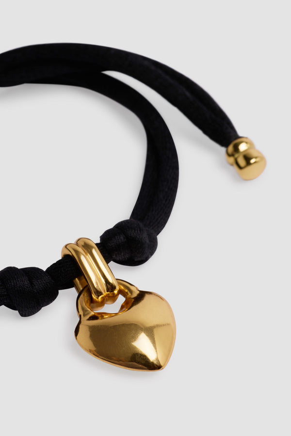 Patou - Bracciale con cuore in ottone dorato e cotone - Black - Bracciale in ottone dorato e cotone nero. Charm a cuore. Doppio spago con punte in ottone dorato.