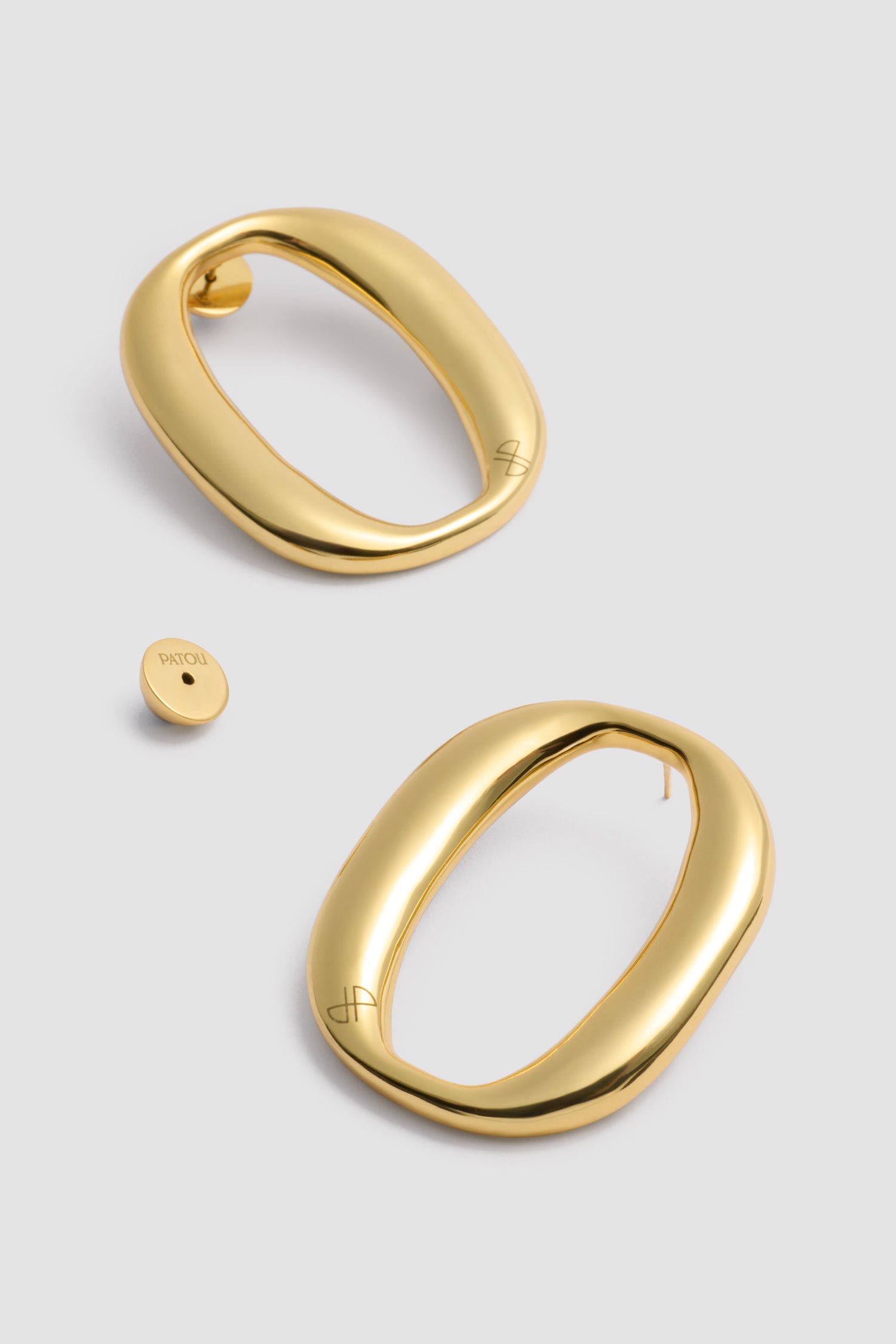 Patou - Oval earrings in gold-plated brass - Gold - Earrings in gold-plated brass. Oval design. Engraved JP monogram. Push stud fastening suitable for pierced ears.