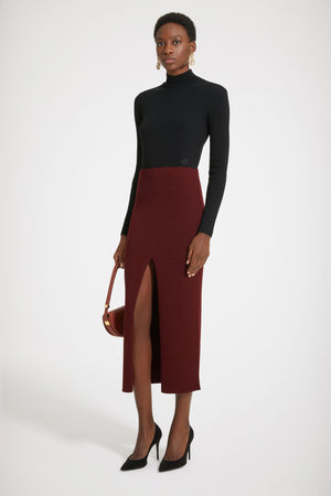 Maglia a costine con collo alto