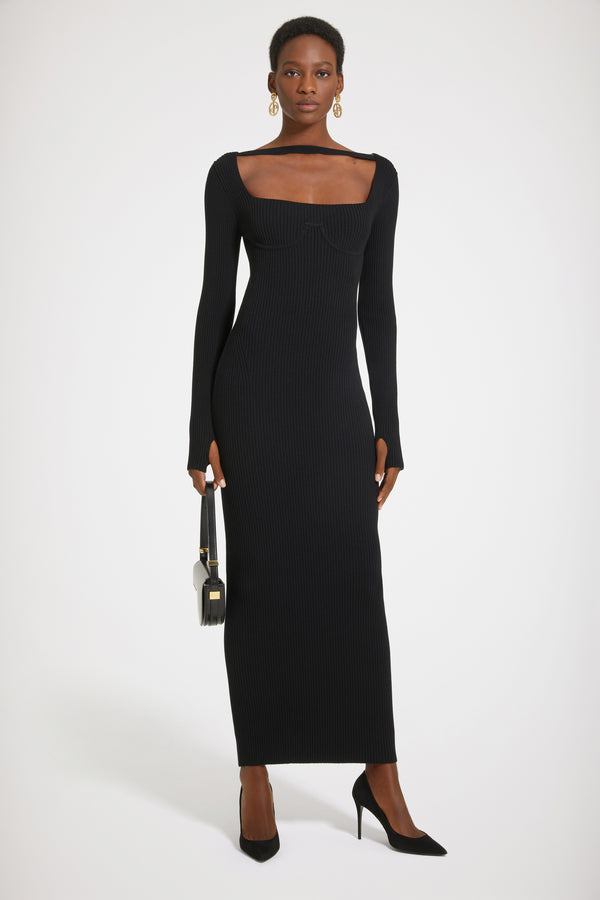Patou - Vestito corsetto a costine in misto lana sostenibile - Black - Ispirazione lingerie, eleganza Patou.Vestito in misto lana nero. Maglia a costine. Lunghezza maxi. Vestibilità aderente. Scollo quadrato con fascia sul collo. Cuciture ispirazione corsetto sul davanti. Maniche allungate con buchi per i polsi.Questo vestito è stretto.