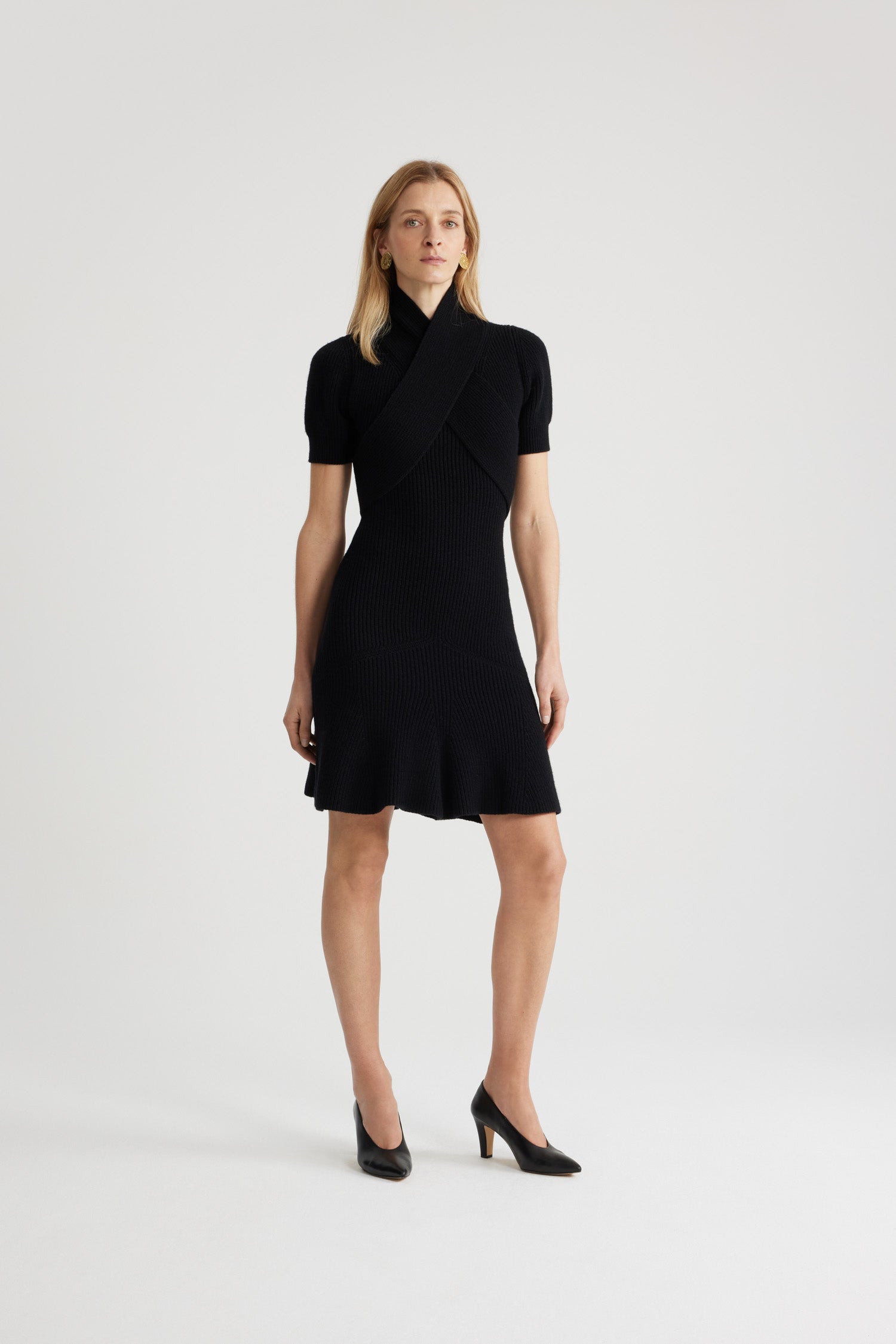 Patou - Wrap front dress in sustainable wool and cashmere - Black - Black sustainable wool and cashmere dress. Fitted silhouette. High neck. Wrap front bodice. Short sleeves. Pleats at the bottom.This style is fitted.