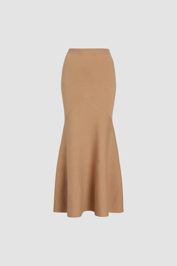 Patou - 지속 가능한 울 및 캐시미어 혼방 페플럼 스커트 - Biscuit - 비스킷 베이지 컬러의 지속 가능한 울 및 캐시미어 혼방 소재. 긴 길이. 밀착된 핏에서 넓게 퍼지는 플레어 페플럼 실루엣. 신축성 있는 허리 부분.힙 부분이 꼭 맞는 피티드 스타일입니다.