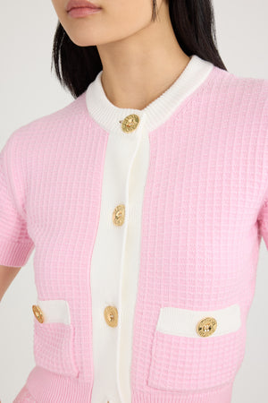 Cardigan corto in maglia di cotone goffrata