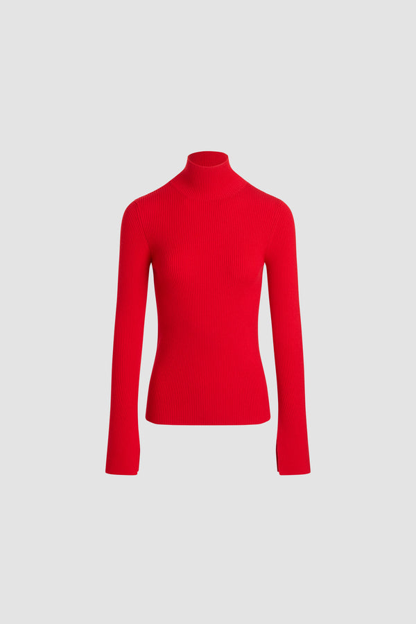 Patou - Ribbed jumper in wool blend - Elixir Red - Elixir Red Merino wool blend jumper. Rib knit. Fitted silhouette. High neck. Elongated sleeves with split cuffs.