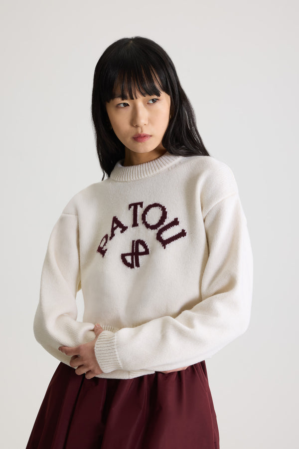Patou - Maglione con logo Patou e monogramma JP intarsiati in lana e cashmere - White - Maglione in lana e cashmere bianco. Collo rotondo. Collo, polsini e fondo a costine. Logo Patou e monogramma JP intarsiati sul davanti.