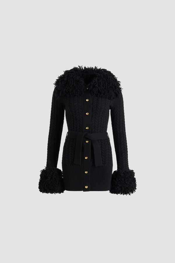 Patou - Cardigan long avec bordure à frange en laine et cachemire - Black - Cardigan en laine mérinos et cachemire noirs. Maille torsadée. Silhouette longiligne. Frange effet fourrure au col et aux poignets. Col large. Boutonnage avant avec boutons boule argentés JP. Ceinture amovible à la taille. Ourlet côtelé.