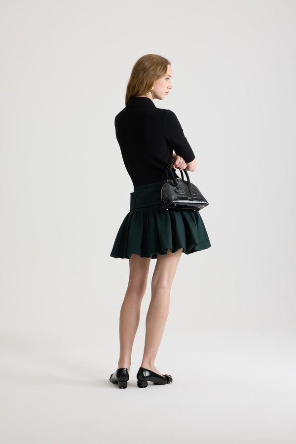 Patou - Polo in lana e cashmere - Black - Top in lana merino e cashmere nero. Silhouette aderente. Colletto largo a polo. Maniche di media lunghezza. Etichetta con logo Patou sul davanti. Polsini e fondo a costine.