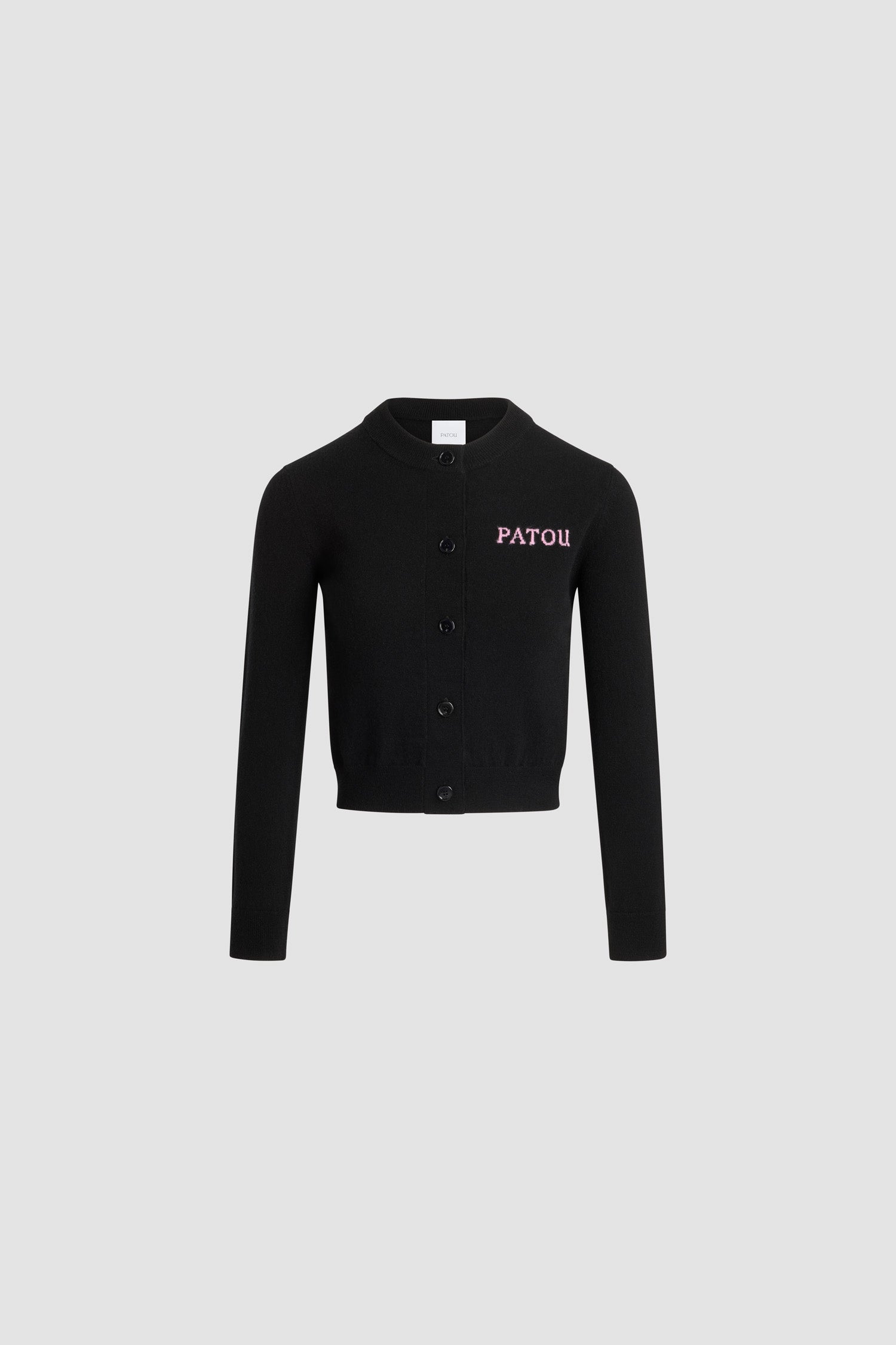Patou - Cardigan en laine et cachemire avec détail Patou en intarsia - Black - Cardigan en laine mérinos et cachemire noirs. Col rond. Boutons en nacre gravés du monogramme JP. Logo Patou contrastant en intarsia sur la poitrine.