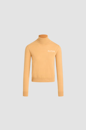 Pull à col roulé en laine et cachemire avec détail Patou en intarsia