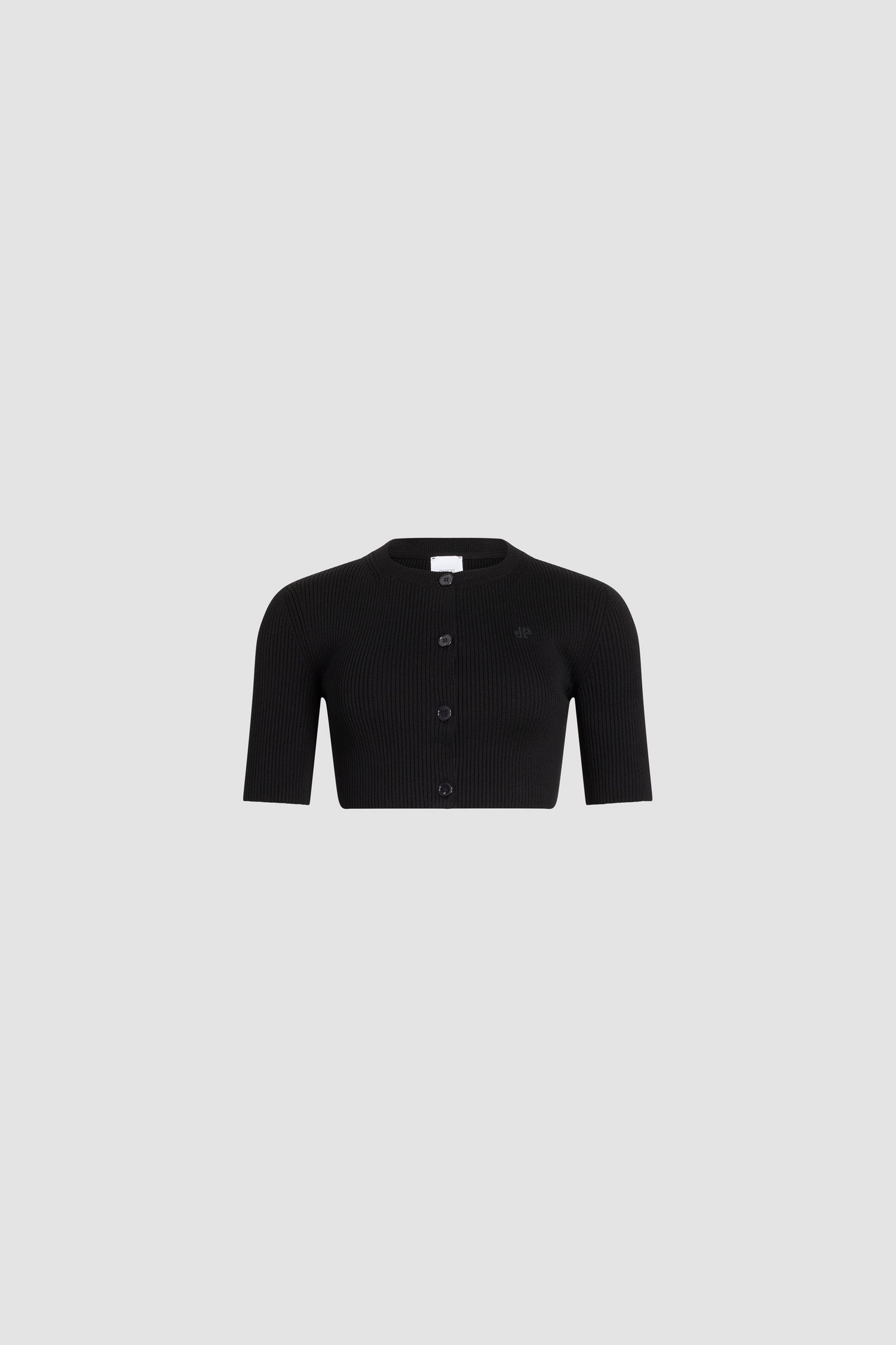 Patou - Cardigan court côtelé en coton mélangé éco-responsable - Black - Cardigan court côtelé noir. Manches courtes. Col rond. Fermeture boutonnée.