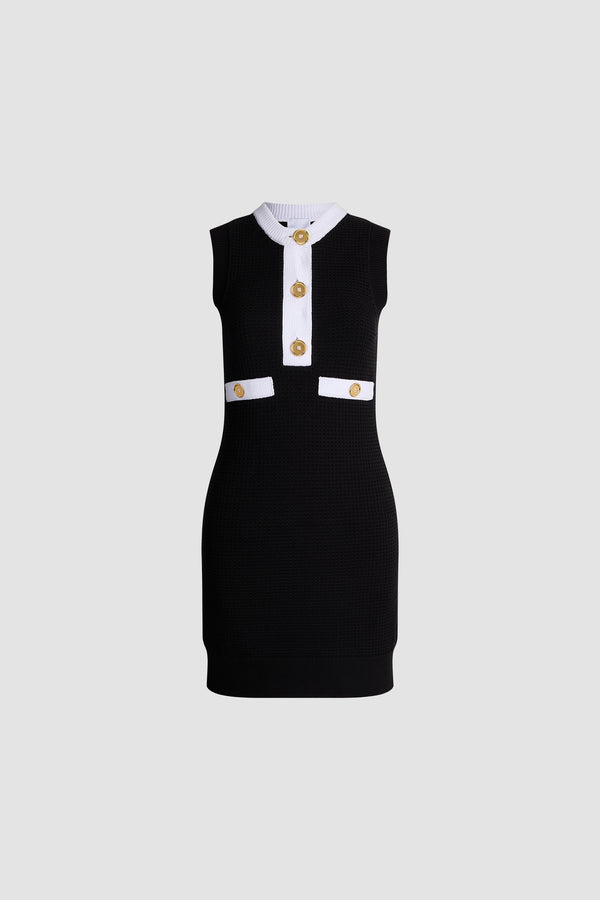 Patou - Robe texturée sans manches en coton mélangé éco-responsable - Black - Robe texturée sans manches noire. Courte. Col rond. Bordures contrastées.