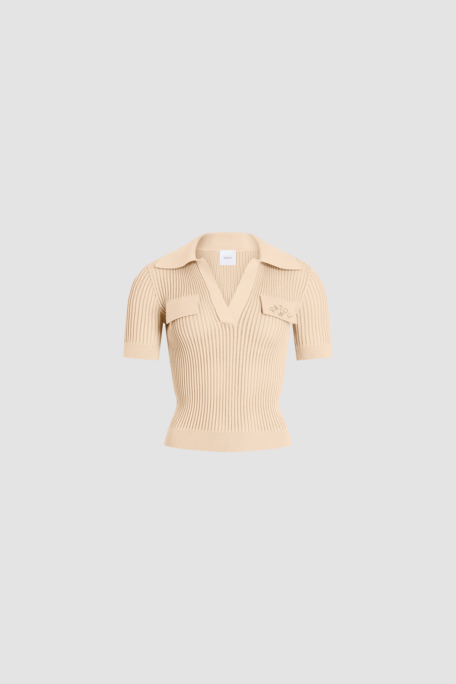 Patou - Besticktes Baumwoll-Poloshirt - Safari Sand - Sandfarbenes besticktes Poloshirt. Kragen. Kurze Ärmel. Ton-in-Ton-Stickerei.