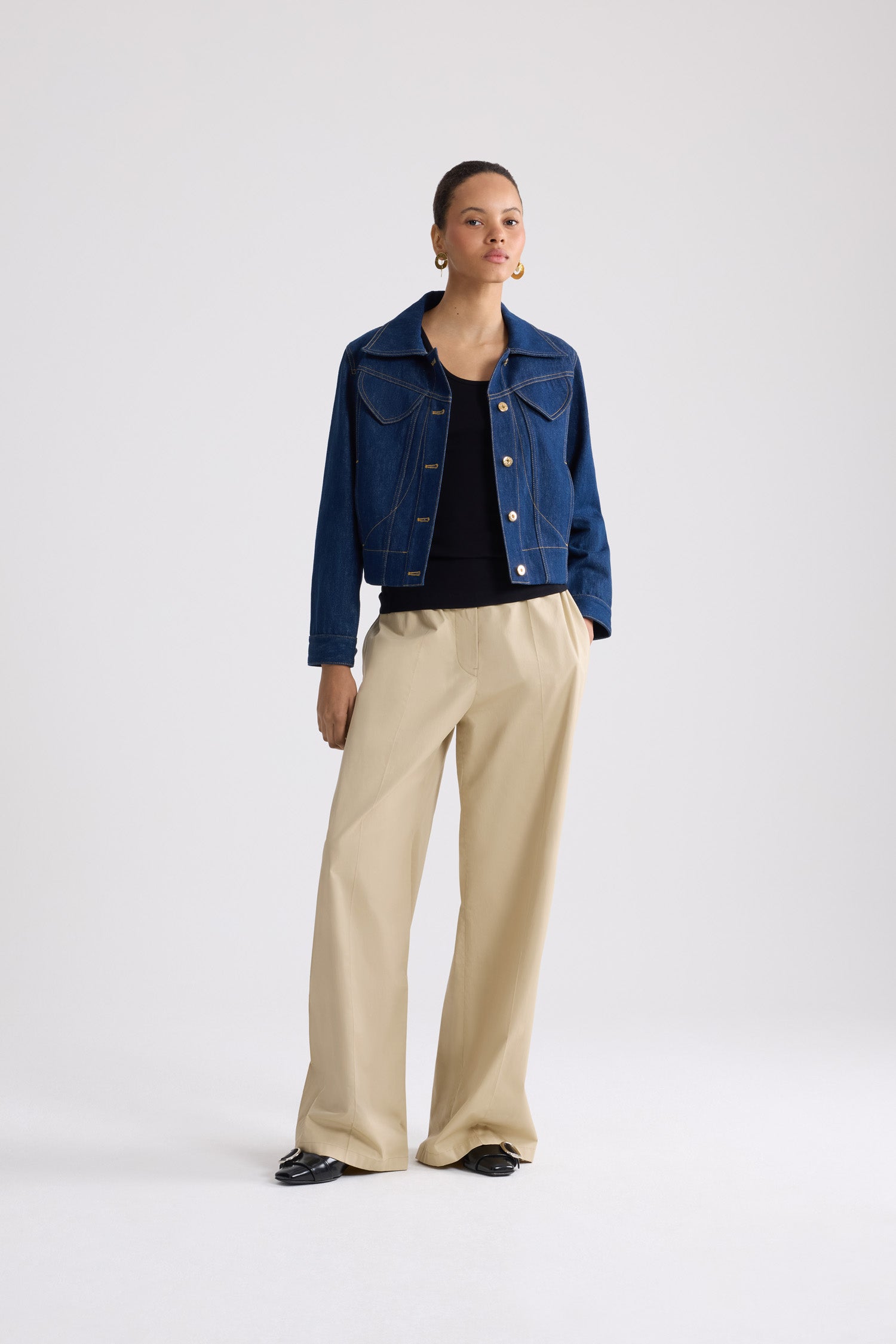 Patou - Embroidered logo denim jacket - Rodeo Blue - Fitted organic blue denim jacket with contrast stitching. Revisited JP logo embroidered on the left sleeve. Engraved gold-coloured buttons down the front, at the waist and cuffs. Two flap chest pockets, two side pockets.Fitted jacket (select one size up for a loose look).