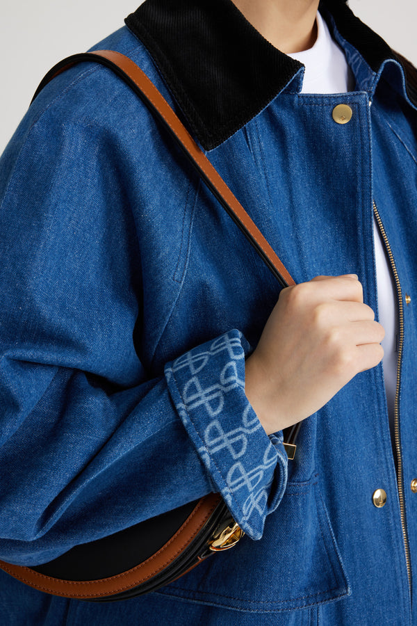 Patou - Parka relaxed in denim bio - Stonewash - Parka in denim bio blu lavato. Vestibilità morbida. Colletto in velluto a coste. Chiusura con bottoni a pressione oro e zip nascosta. Maxi tasche con pattina. Maniche raglan. Polsini abbottonati con stampa JP all&#39;interno. Patou ricamato sul retro.