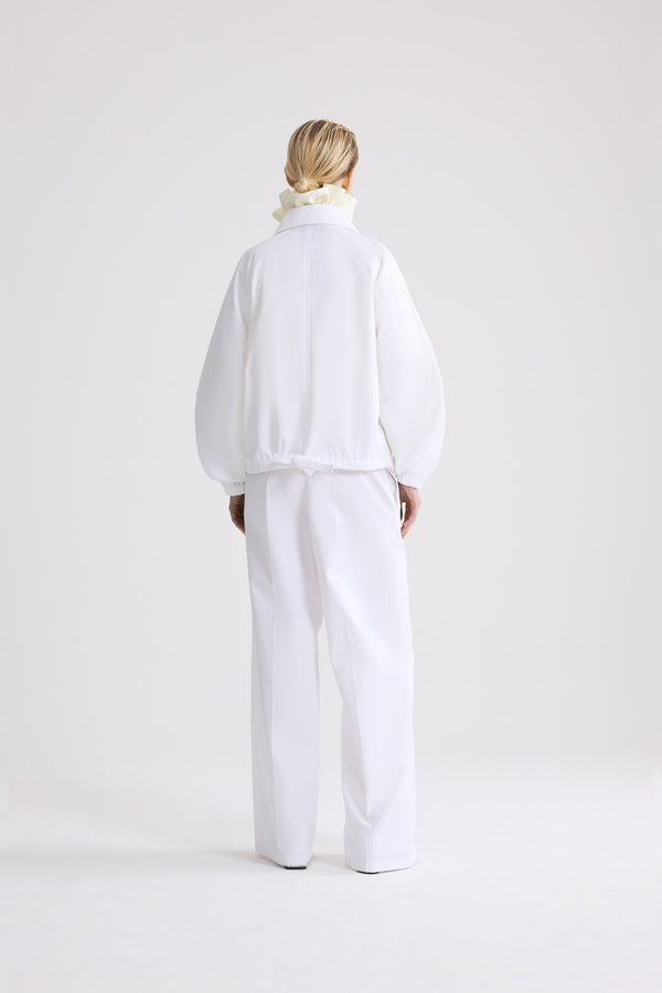 Patou - Blouson zippé en coton bio - White - Blouson zippé blanc. Col classique. Fermeture éclair dorée.