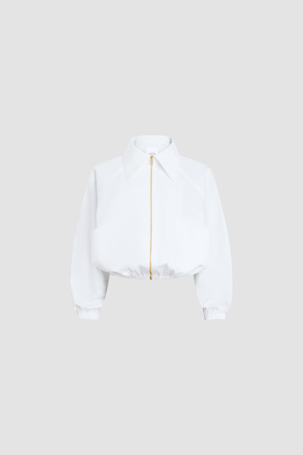 Patou - Blouson zippé en coton bio - White - Blouson zippé blanc. Col classique. Fermeture éclair dorée.