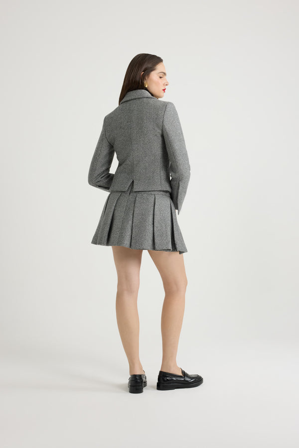 Patou - 텍스처드 울 소재의 플리츠 미니 스커트 - Graphite - 예쁜 플리츠.그래파이트 그레이 울 스커트. 대각선으로 이어진 투톤 스트라이프 디테일의 텍스처드 테일러링 패브릭. 짧은 기장. 넓은 박스 플리츠. 뒷면의 지퍼 여밈. 전체 안감 처리.이 스커트는 로우 웨이스트 디자인입니다.