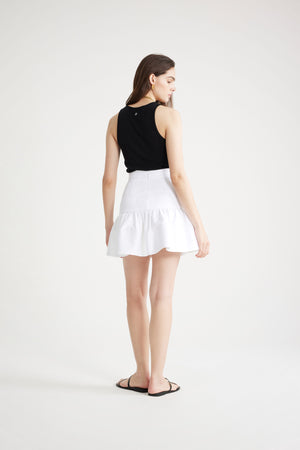 Minigonna con balza in gabardine