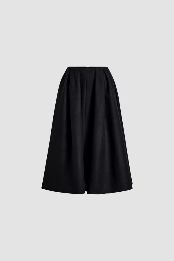 Patou - Jupe midi plissée en laine et cachemire éco-responsable - Black - Jupe en mélange de laine et cachemire éco-responsable noir. Longueur midi. Taille haute. Plis larges. Fermeture par zip au dos. Modèle doublé.