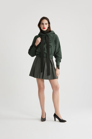 Pleated mini skirt in sustainable technical wool twill