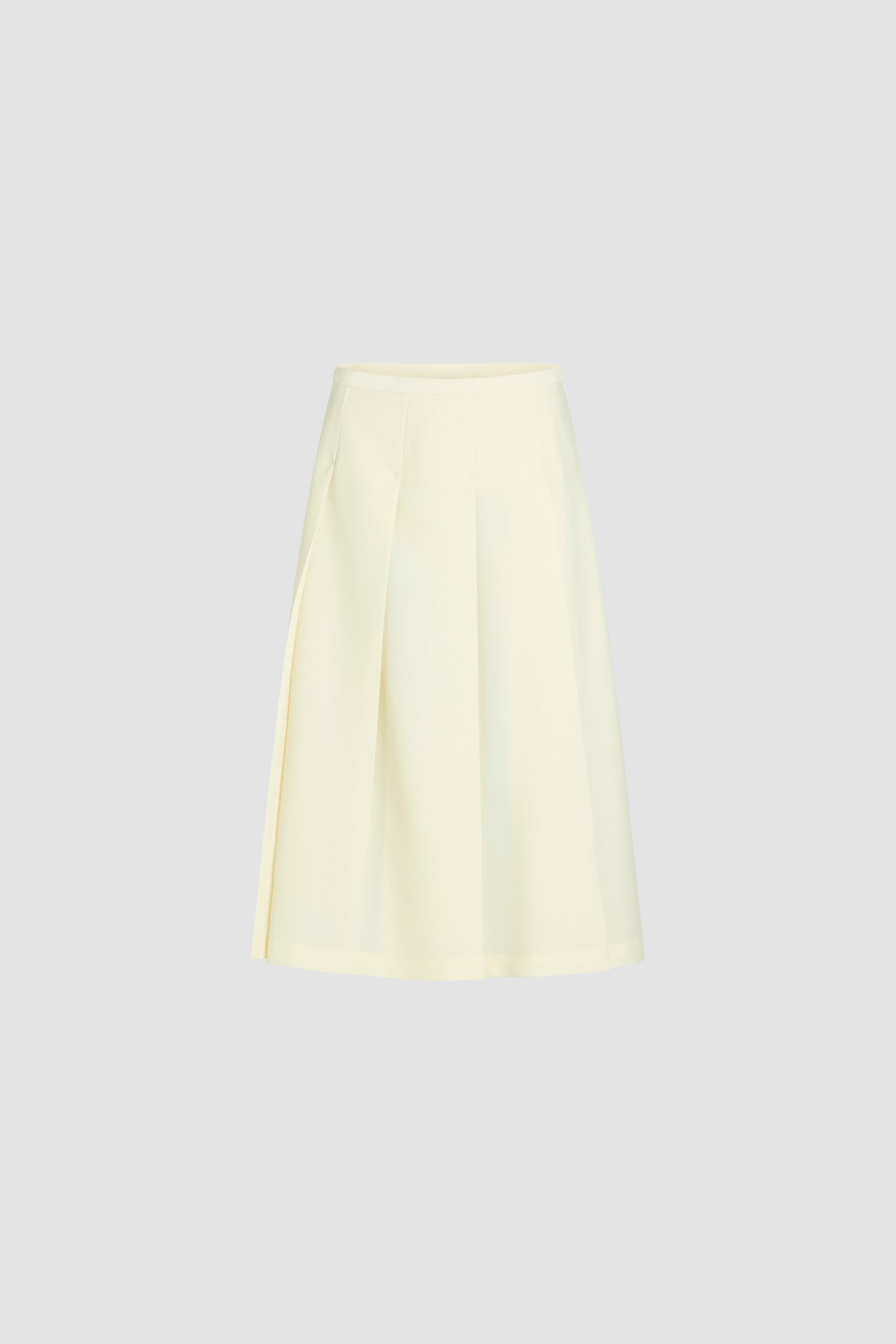 Patou - Pleated midi skirt in sustainable technical wool twill - Ivory - Ivory technical sustainable technical wool twill skirt. Midi length. Grosgrain trim at the waist. Wide pleats. Zip fastening at the side.