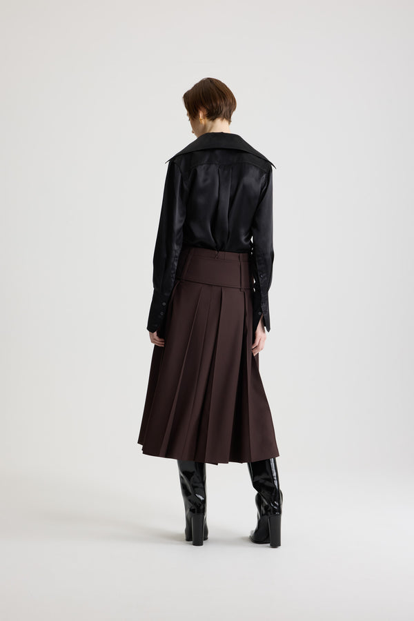 Patou - Belted midi skirt in sustainable technical wool - Smoked Ebony - Smoked Ebony sustainable technical wool twill skirt. Midi length. Mid waist. Wide box pleats. Zip fastening at the back. Wide fabric belt with fabric-covered buckle and gold-tone D-ring. Lined.