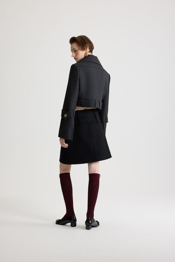 Patou - Zip front belted mini skirt in wool - Black - Black wool skirt. Short length. Low waist. Gold-tone two-way zip fastening at the front. Wide fabric belt at the hips with fabric-covered buckle and gold-tone D-ring. Low pockets at the front. Lined.