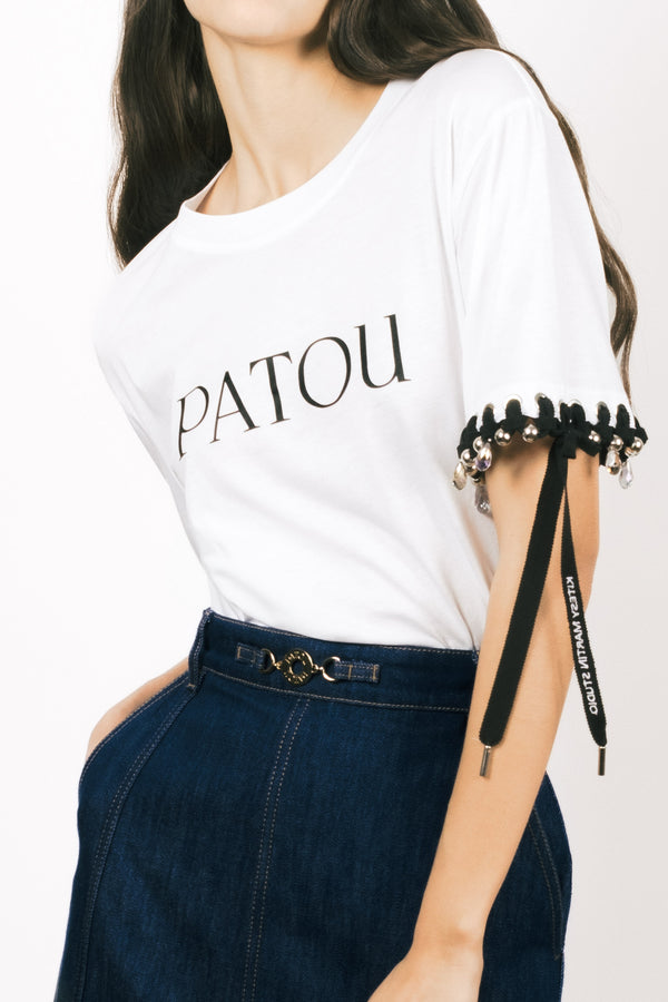 Patou - Patou Upcycling maglietta in cotone bio - Black - For its inaugural edition, Patou partners with French designer Kitesy Martin, founder of Kitesy Martin Studio.T-shirt in cotone bio bianco. Collo rotondo, vestibilità classica. Logo Patou nero sul davanti.Limited Edition.