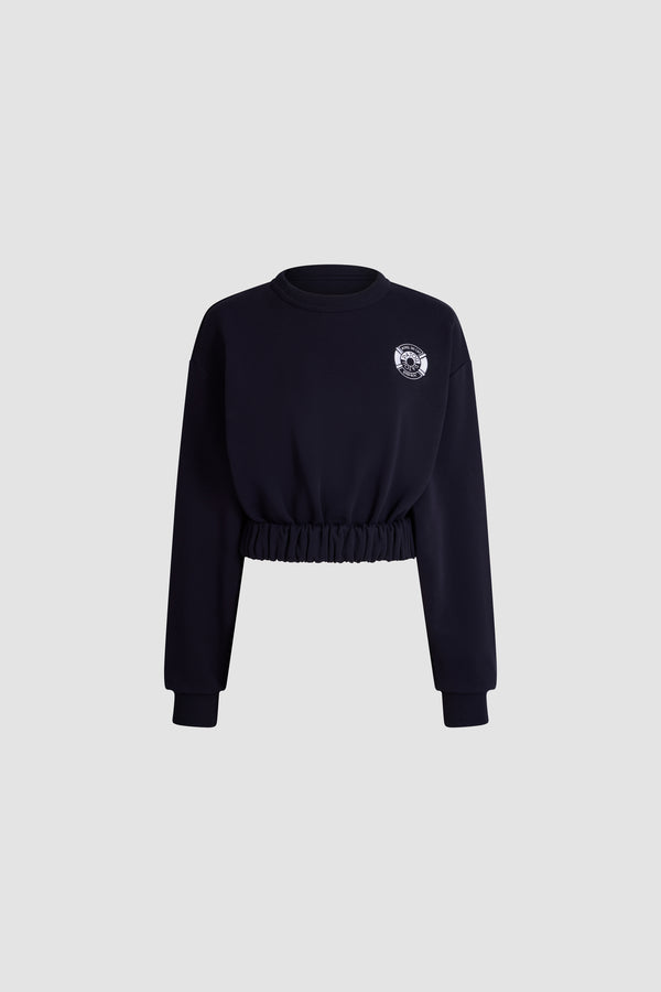 Patou - Patou x Hôtel Du Cap-Eden Roc Cropped Sweatshirt In Organic Cotton - Deep Sea Blue - A summer capsule collection exclusively available at Hôtel du Cap-Eden-Roc.Navy blue sweatshirt in organic cotton. Cropped fit. High neck. Gathered waist. Long sleeves. Patou logo on the chest.