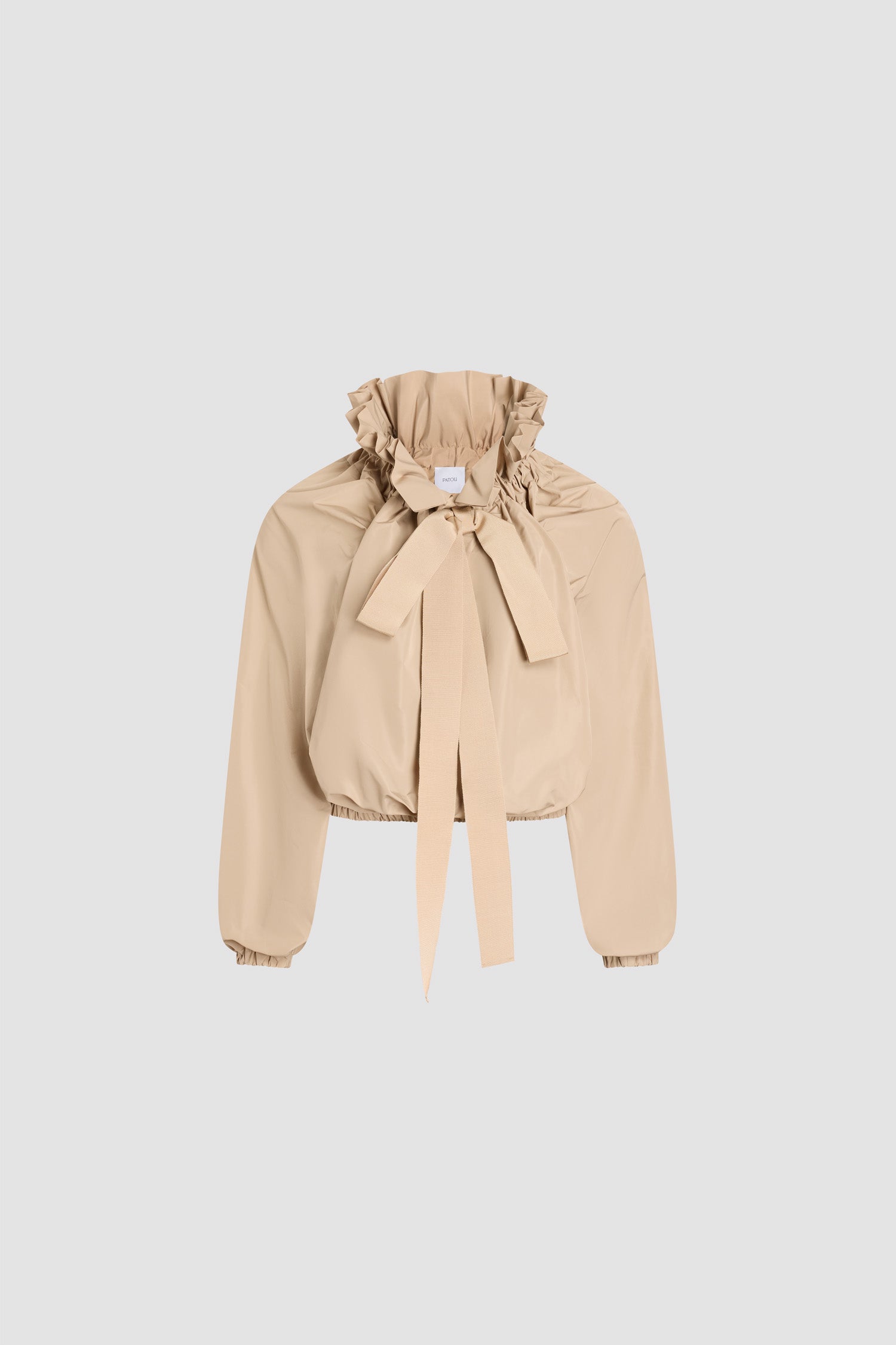 Patou - Iconic Recycled Faille Voluminous Top - Dune - Iconic voluminous top in sand-colored recycled faille. Very voluminous silhouette, can be worn tied at the neck or with bare shoulders. Drawstring collar with front gathering and long grosgrain ties. Batwing sleeves with elasticated cuffs. Elasticated waist.
