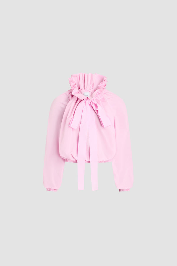 Patou - Top iconique à volume en faille recyclée - Primrose Pink - Top iconique à volume rose. Silhouette très volumineuse pouvant être portée nouée au cou ou avec les épaules dénudées. Col à coulisse avec fronce à l'avant et longs liens en gros-grain. Manches chauve-souris avec poignets élastiques. Taille élastique.