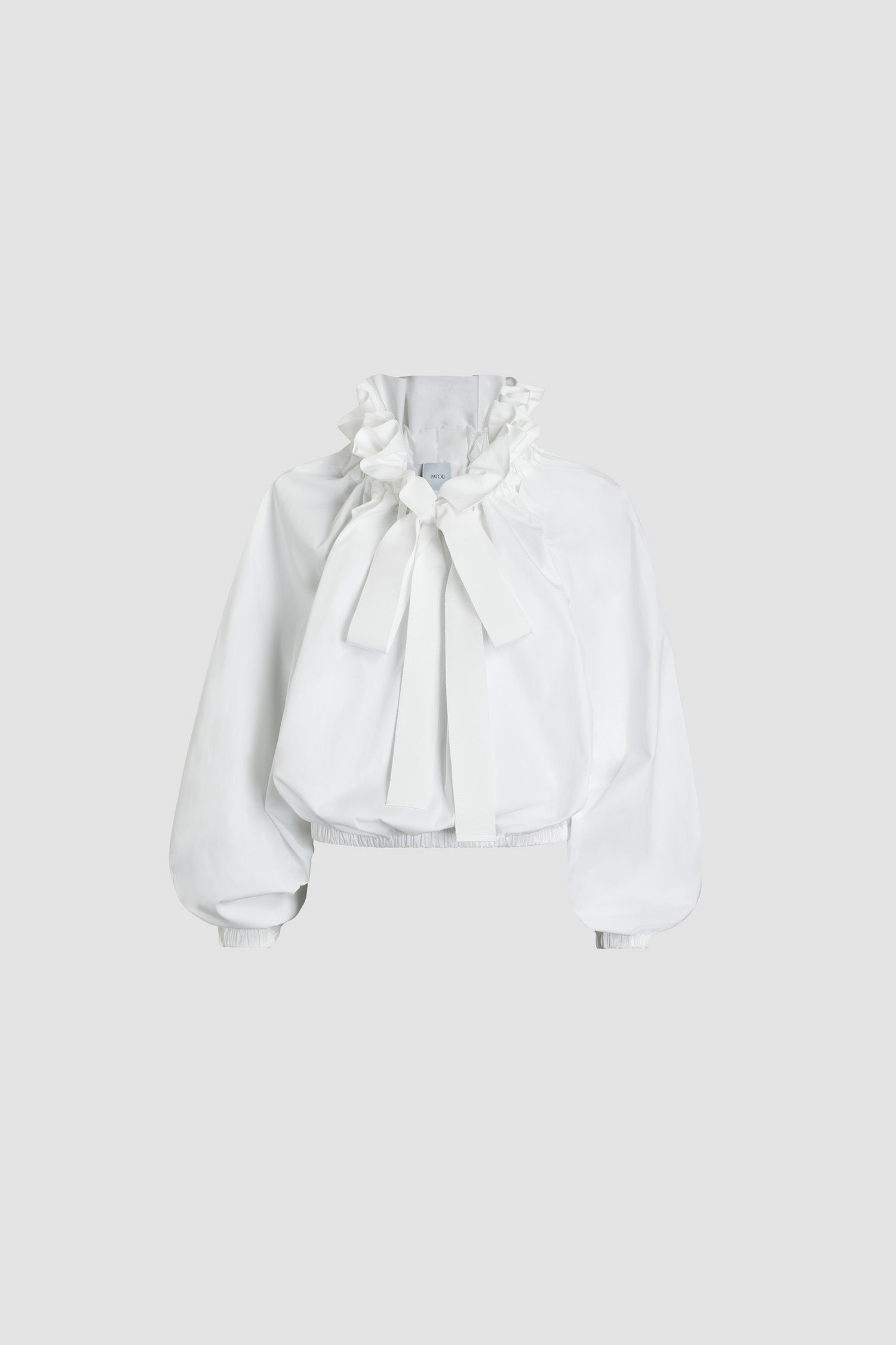 Patou - La Patou Blouse in organic cotton poplin - White - White organic poplin cotton top. High volume silhouette. Drawstring collar with ruching. Batwing sleeves with elasticated cuffs. Elasticated waist.