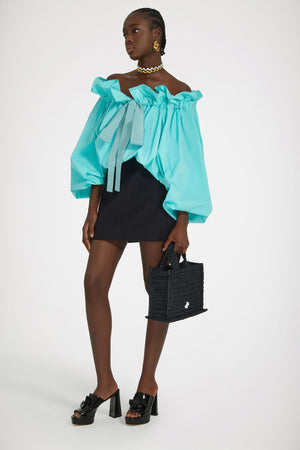 Top con maniche a palloncino in cotone ecosostenibile