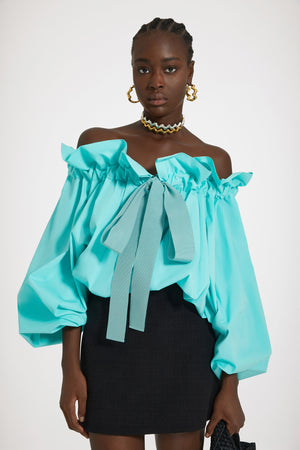 Top con maniche a palloncino in cotone ecosostenibile