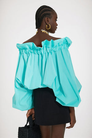 Top con maniche a palloncino in cotone ecosostenibile