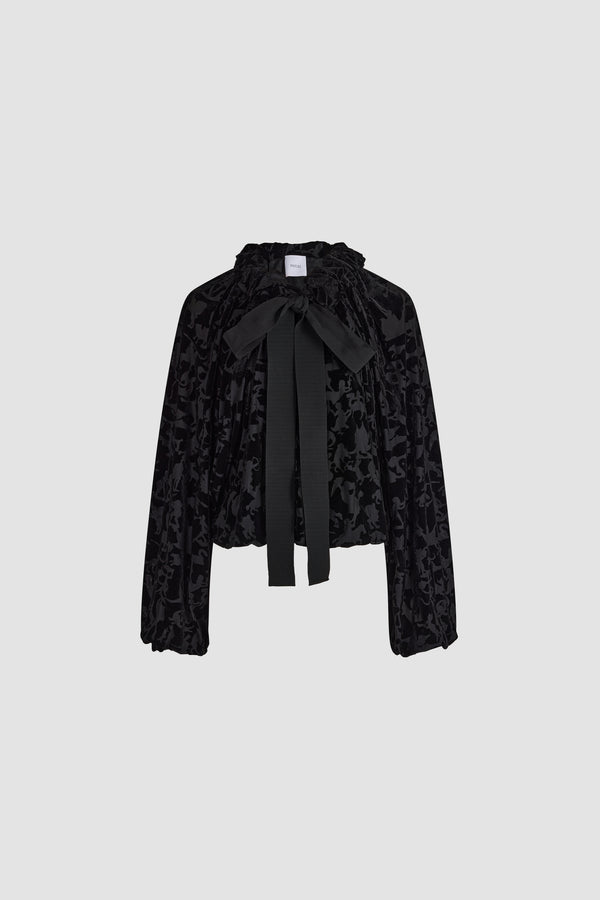 Patou - Voluminöses Devoré-Top aus Polyester-Mischung - Black - Schwarzes Top aus Polyester-Mischung. Devoré-Muster. Lässiges Volumen. Gerüschter Kragen mit Bindeband. Lange Puffärmel. Elastischer Bund und Ärmelabschlüsse.