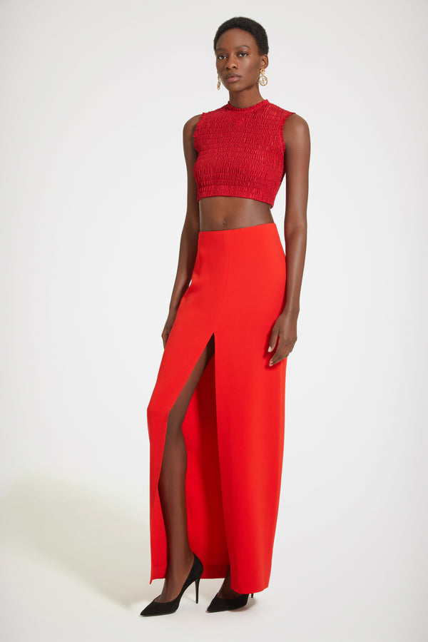 Patou - 친환경 파유 소재의 스목 크롭 탑 - Lipstick Red - 스목 및 크롭 디자인의 사랑스러운 탑.립스틱 레드 재생 파유 탑. 피티드 크롭 실루엣. 라운드 넥라인. 슬리브리스 앞면의 JP 자수 장식. 시그니처 JP 풀탭이 달린 뒷면의 골드 톤 양방향 지퍼.밀착되는 핏 스타일.